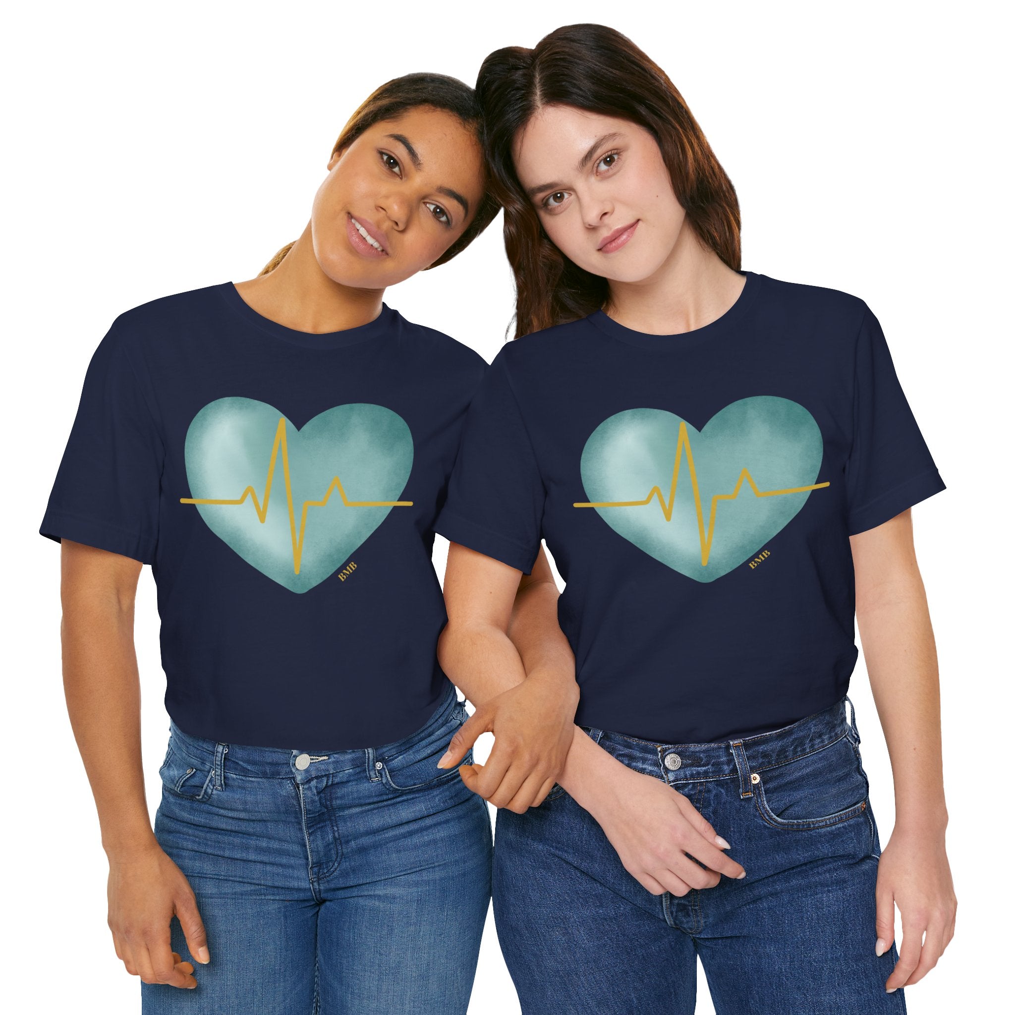 Women wearing matching Heartbeat Heart Tees in navy — nurse appreciation gift shirts